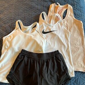 Lot of three tanks and Lululemon shorts